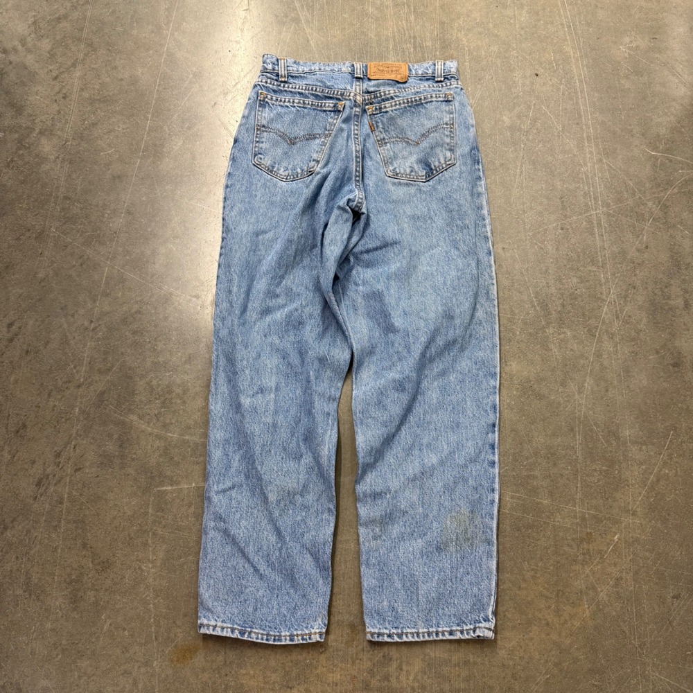 Vintage Levis 560 Loose Fit Tapered Leg Jeans 28x28 Light Wash Orange Tab USA